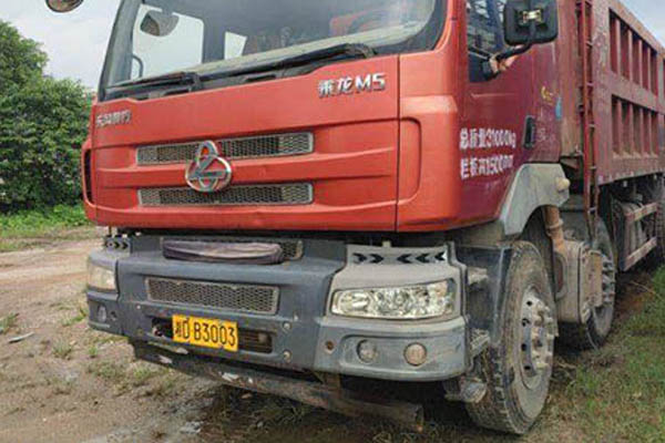 Dongfeng Liuzhou Motor Chenglong M5 310HP 8x4 7.6m dump truck (National V) with 4x4 front and 8x8 re for sale